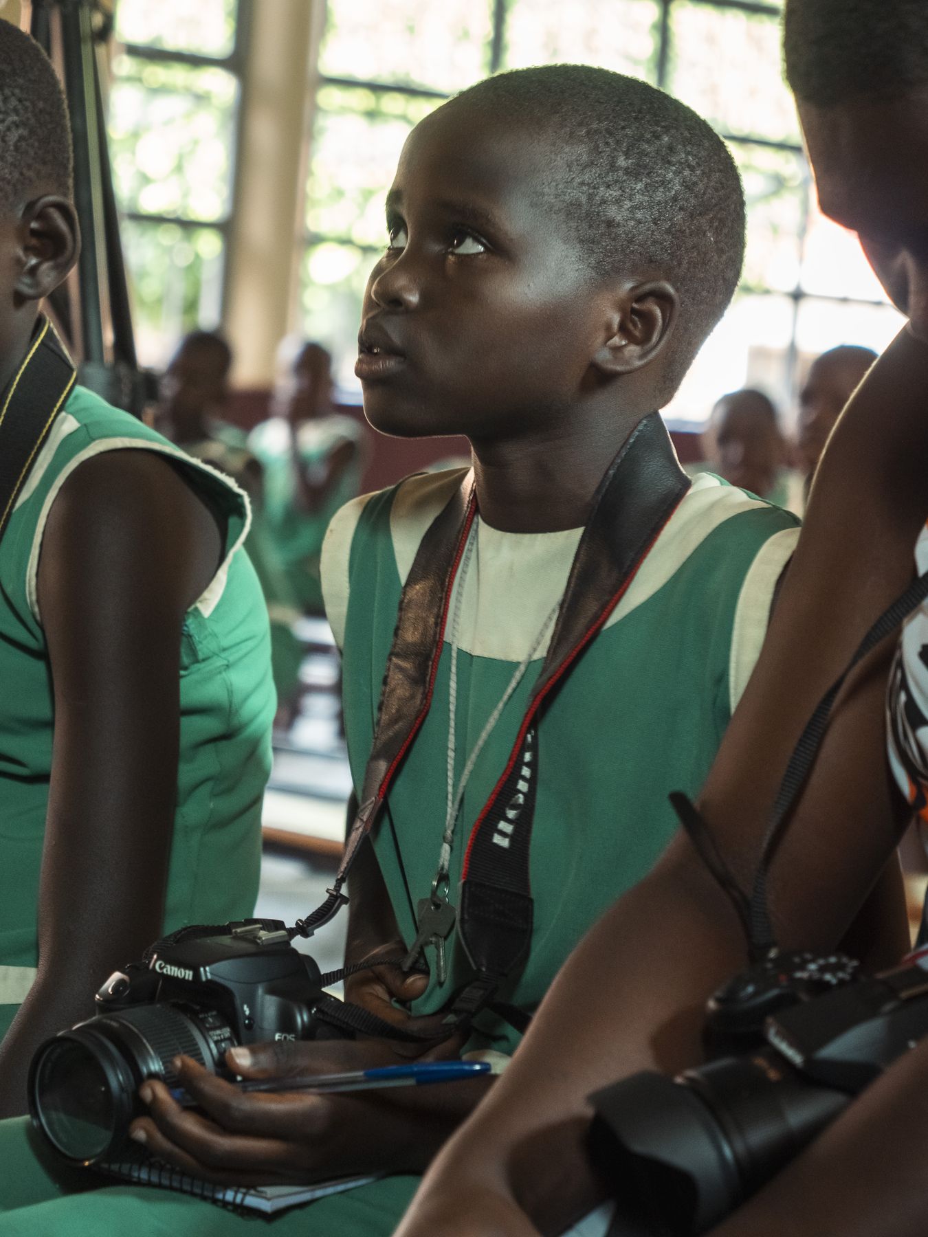 A girl holding a camera