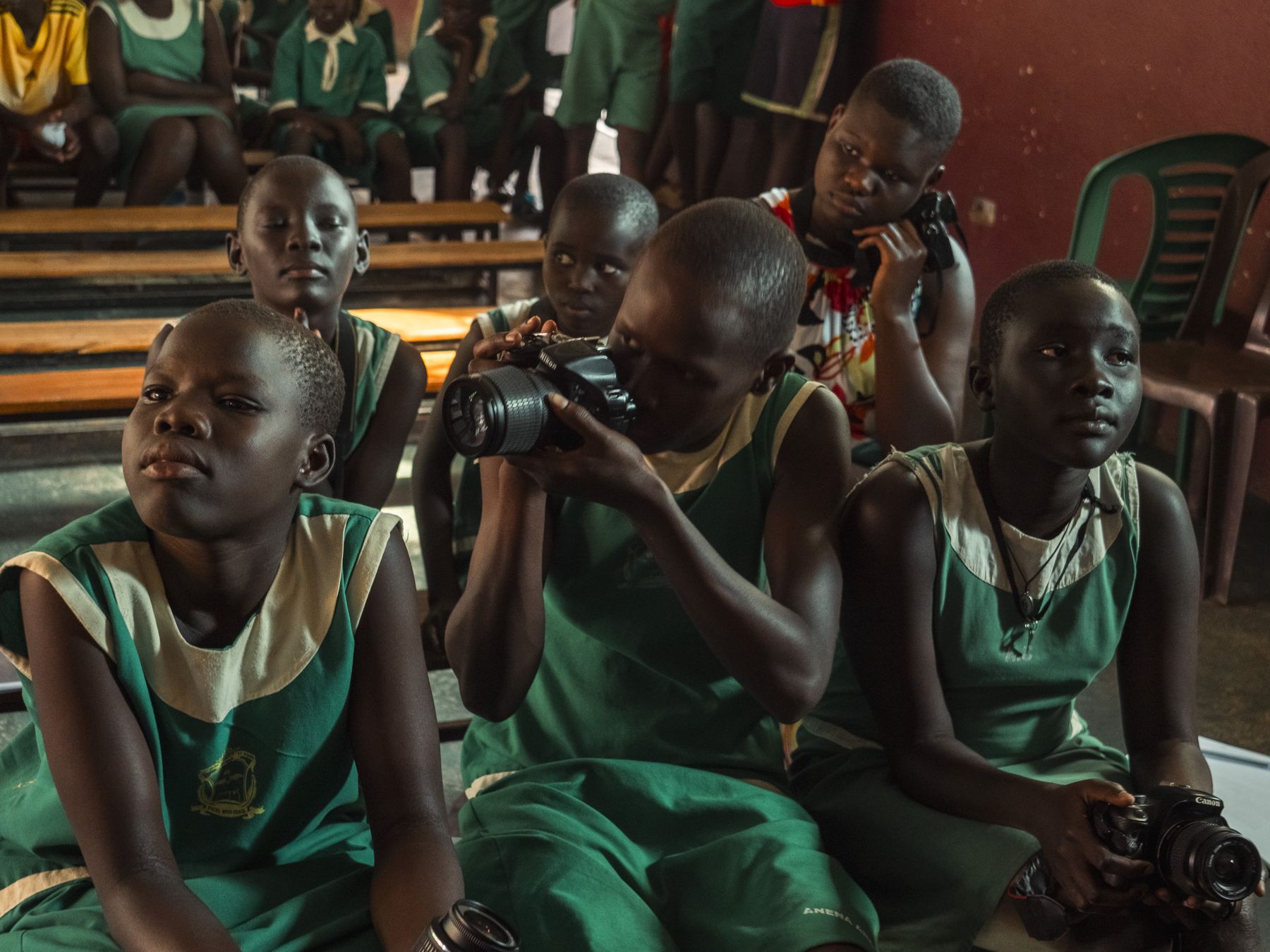 Young people of MOJA with cameras