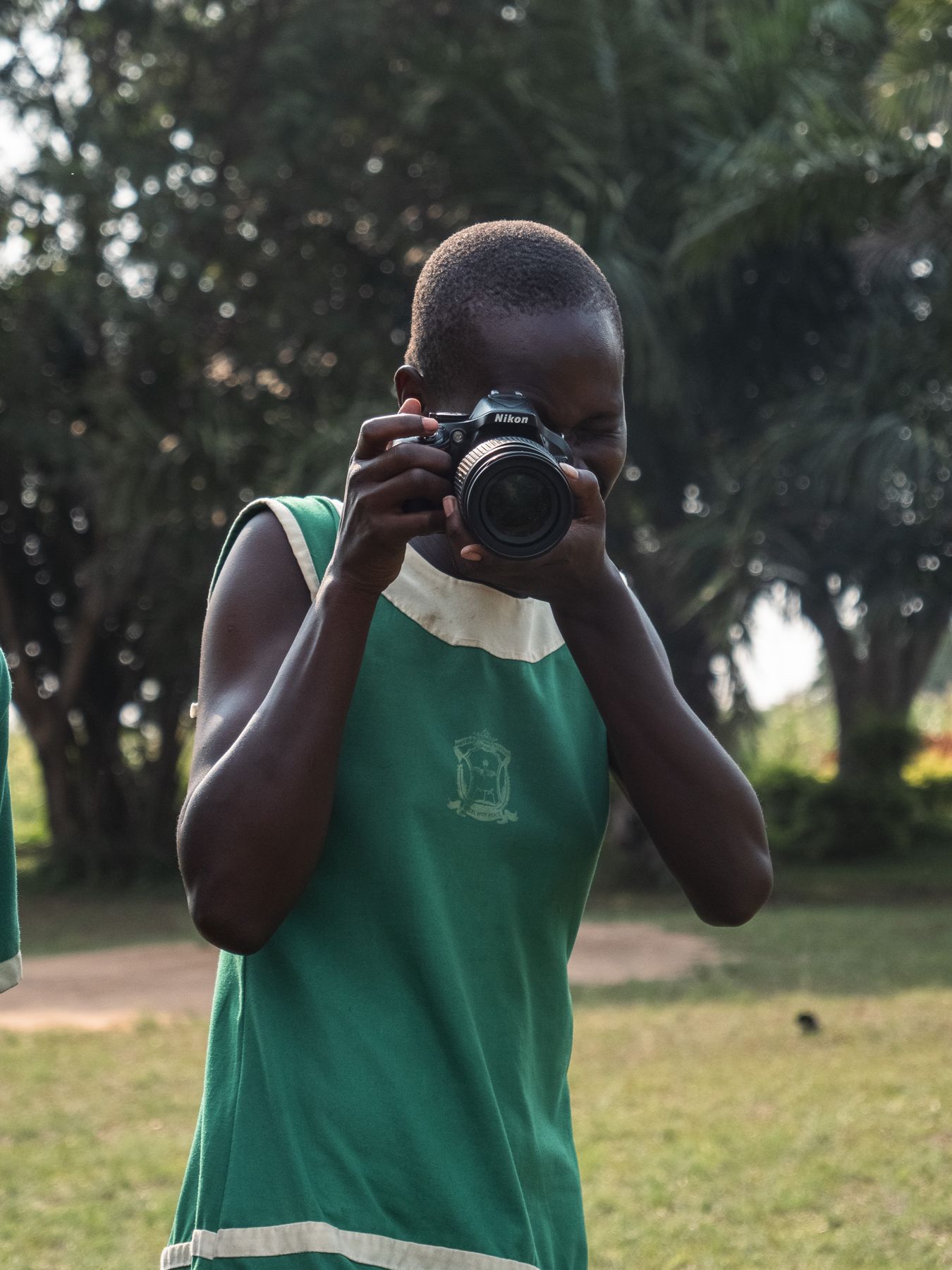 A girl photographing outdoors