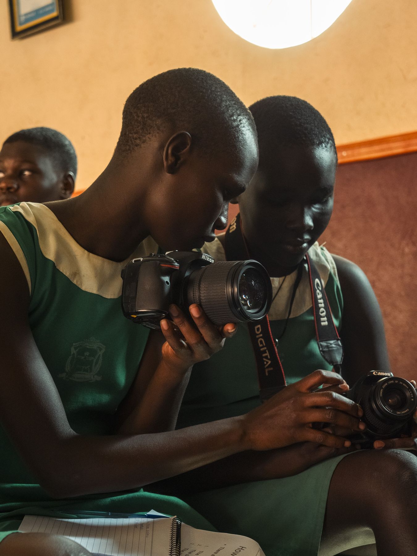 Girls looking at a camera together